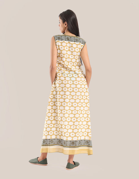 Sleeveless long dress with asymmetric hemline