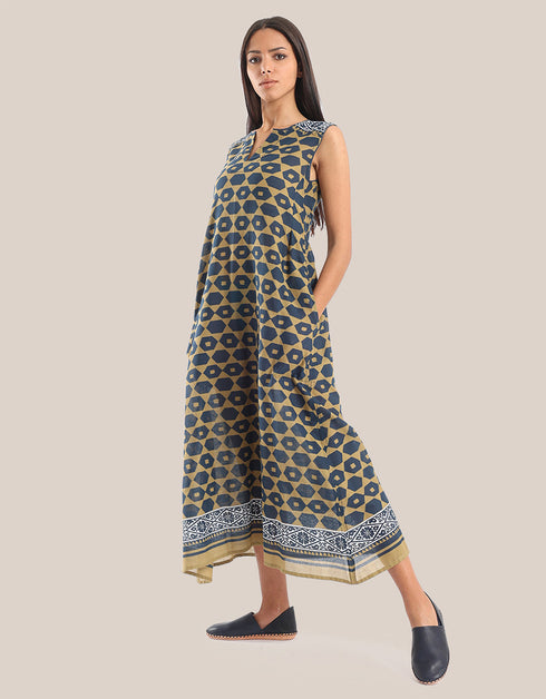 Sleeveless long dress with asymmetric hemline