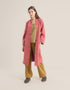 Quilted short coat with long sleeves and embroidery on front collar and back
