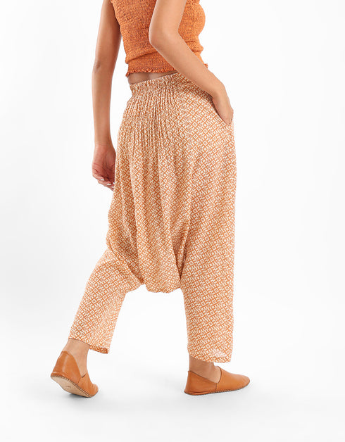 Printed harem pants with pleats on the front and back