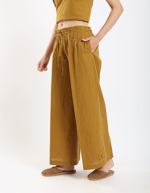 سراويل كتان بساق واسعة مع أنابيب أمامية