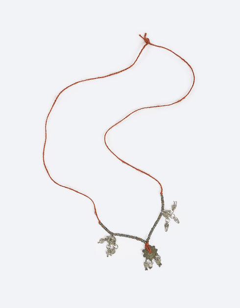 Necklace with antique silver pieces