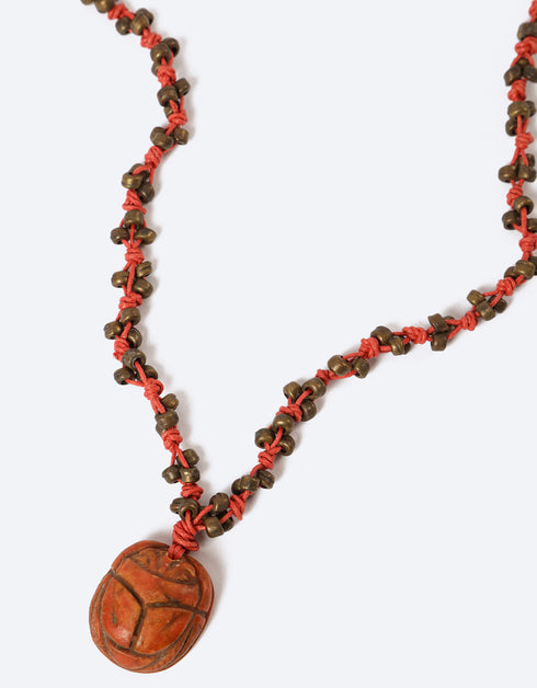 Carved scarab stone necklace