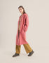 Quilted short coat with long sleeves and embroidery on front collar and back