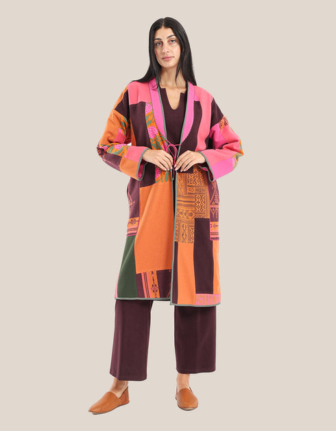 Reversible patchwork coat in mixed textiles with pockets on both sides