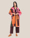 Reversible patchwork coat in mixed textiles with pockets on both sides