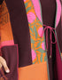 Reversible patchwork coat in mixed textiles with pockets on both sides