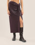 Metallic stitching jersey skirt with front draping and knot