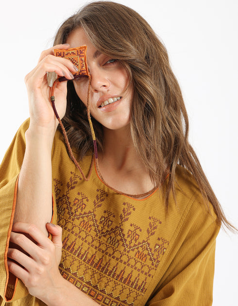 Leather long necklace in leather with embroidered cotton pendant