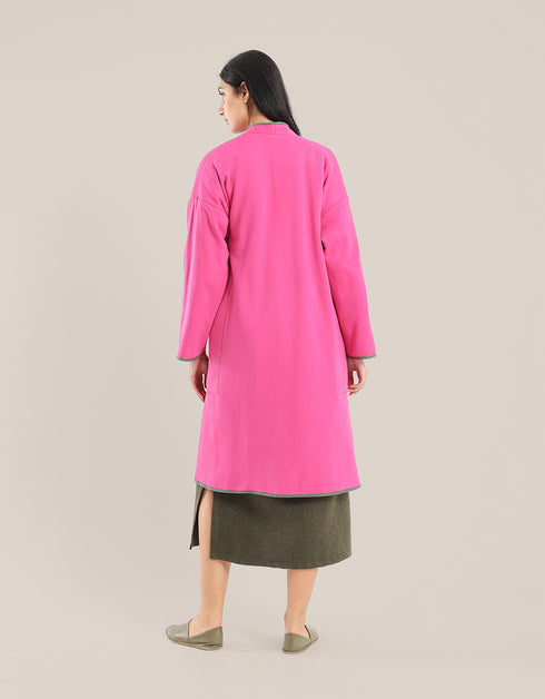 Reversible patchwork coat in mixed textiles with pockets on both sides