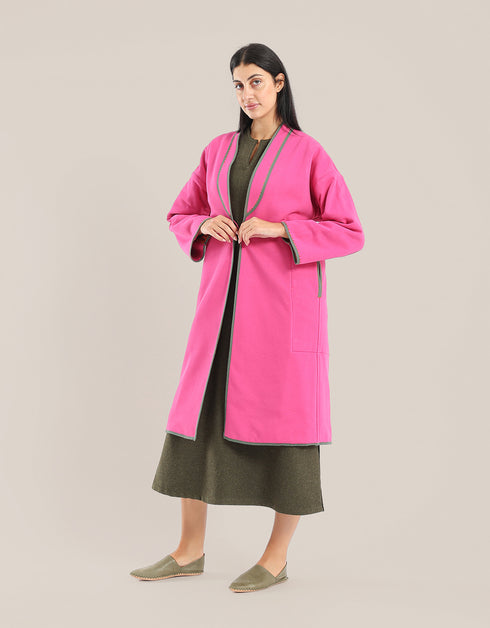 Reversible patchwork coat in mixed textiles with pockets on both sides