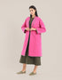 Reversible patchwork coat in mixed textiles with pockets on both sides