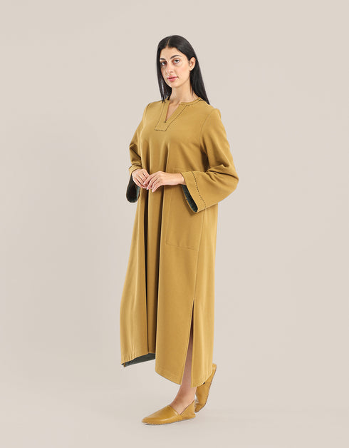 Milton long dress with round neckline with slits,