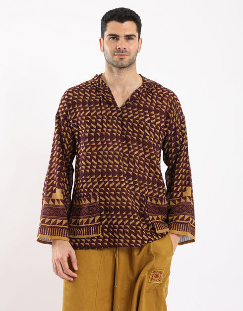 Printed cotton hooded gauze shirt with two front puff pockets.
