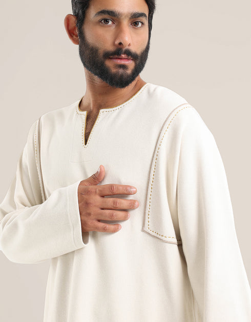 Sweater with round neckline with slits