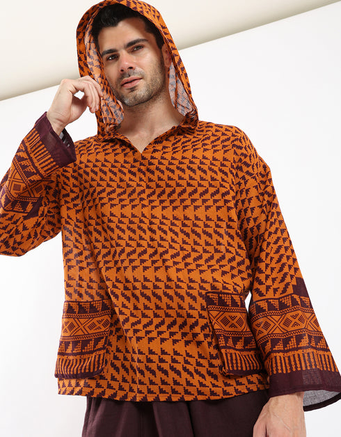 Printed cotton hooded gauze shirt with two front puff pockets.