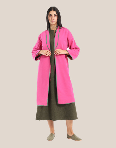 Reversible patchwork coat in mixed textiles with pockets on both sides