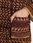 Printed cotton hooded gauze shirt with two front puff pockets.