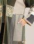 Reversible patchwork coat in mixed textiles with pockets on both sides