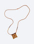 Leather long necklace in leather with embroidered cotton pendant