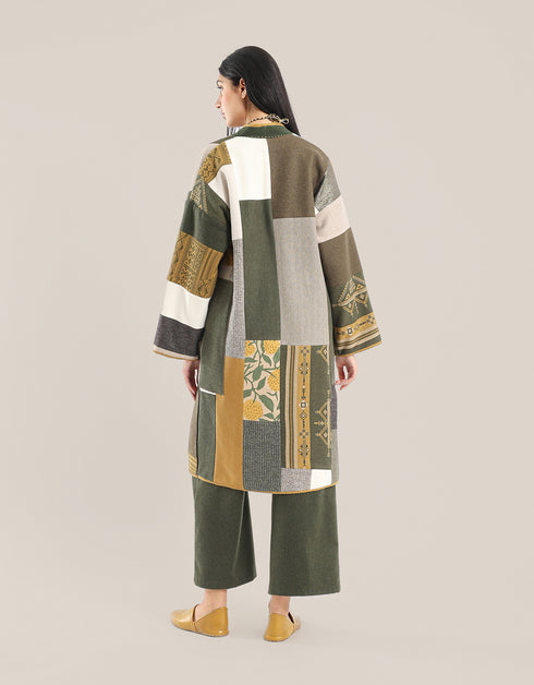 Reversible patchwork coat in mixed textiles with pockets on both sides