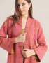 Quilted short coat with long sleeves and embroidery on front collar and back