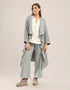 Coat with draped collar