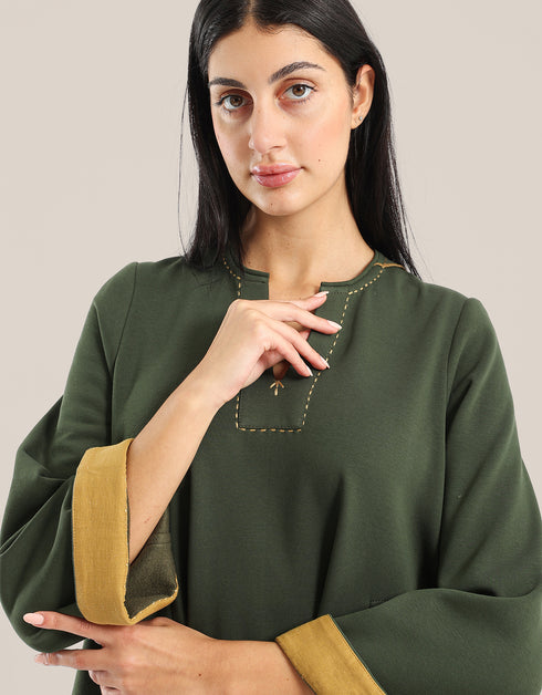 Milton long dress with round neckline with slits,