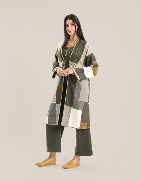 Reversible patchwork coat in mixed textiles with pockets on both sides