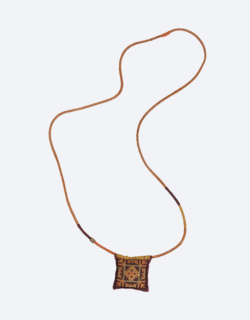 Leather long necklace in leather with embroidered cotton pendant