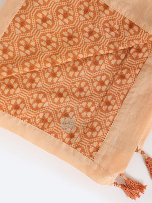 Shawl in light printed cotton with tassels on 4 corners