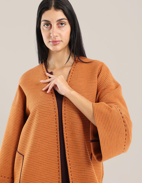 معطف مخطط مبطن قابل للعكس مع لونين مختلفين على كل جانب