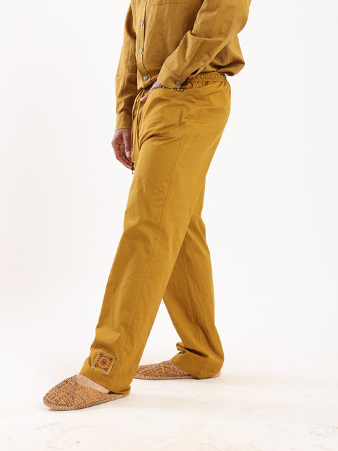 Straight leg cotton pants with patch pockets on the front