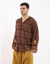 Printed cotton hooded gauze shirt with two front puff pockets.