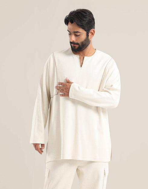 Sweater with round neckline with slits