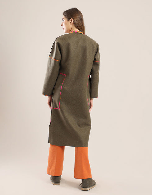 Short coat with long decorative