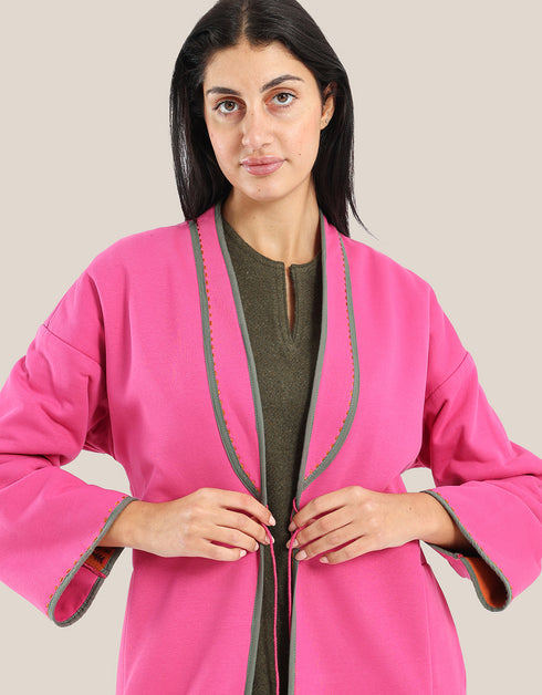 Reversible patchwork coat in mixed textiles with pockets on both sides