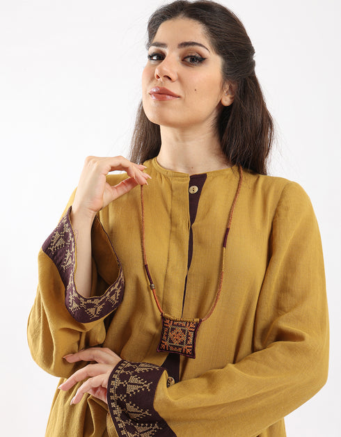 Leather long necklace in leather with embroidered cotton pendant